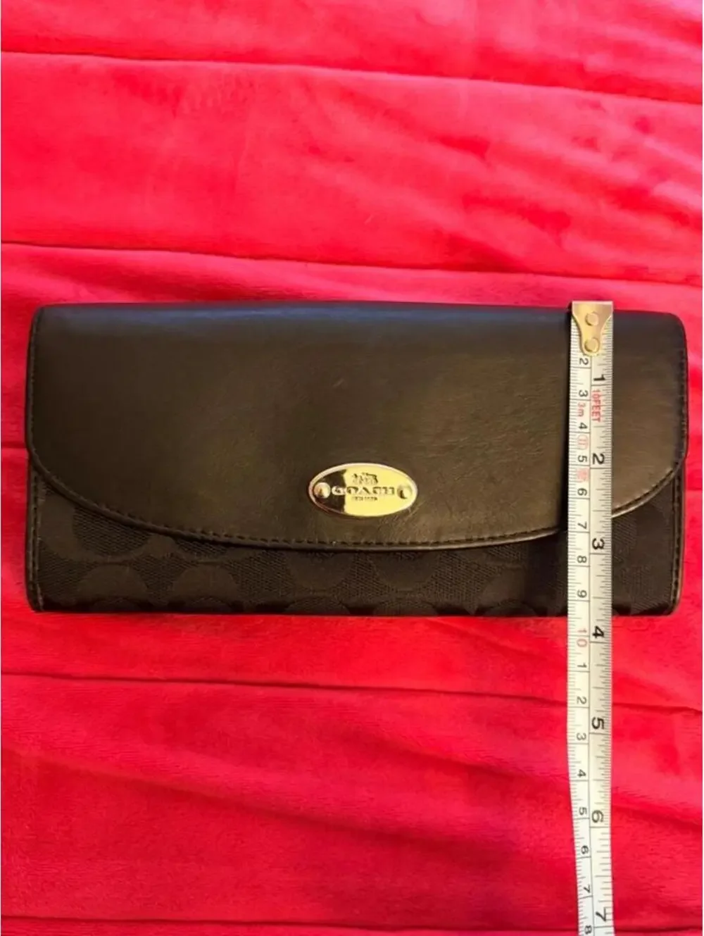 Black Coach Wallet with Silver Emblem